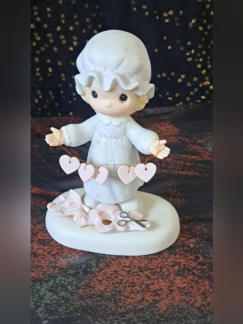 Precious Moments figurine titled "You Have Touched So Many Hearts" (Item E-2821)